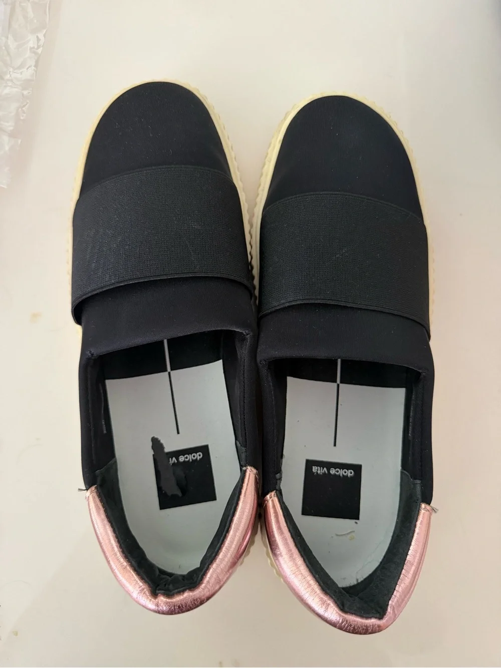 Dolce Vita Black Slip-On Sneakers with Rose Metallic Heel Tab